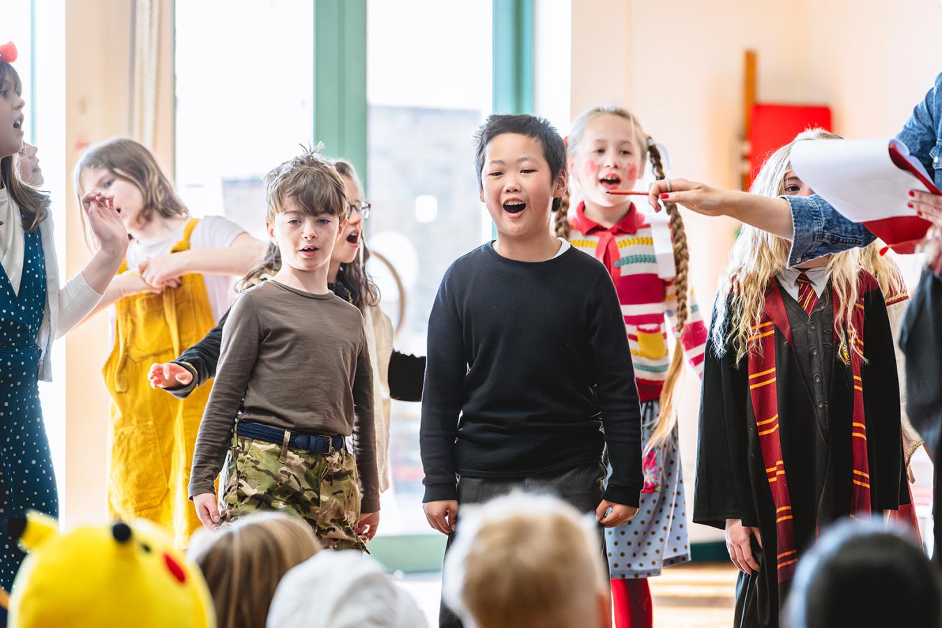Children taking part in a drama workshop