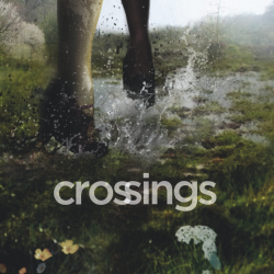 legs from knees down dancing in puddle with Crossings title