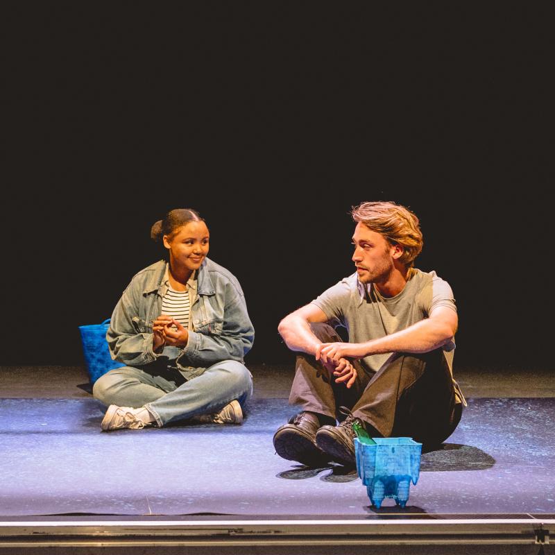 Two young actors on stage